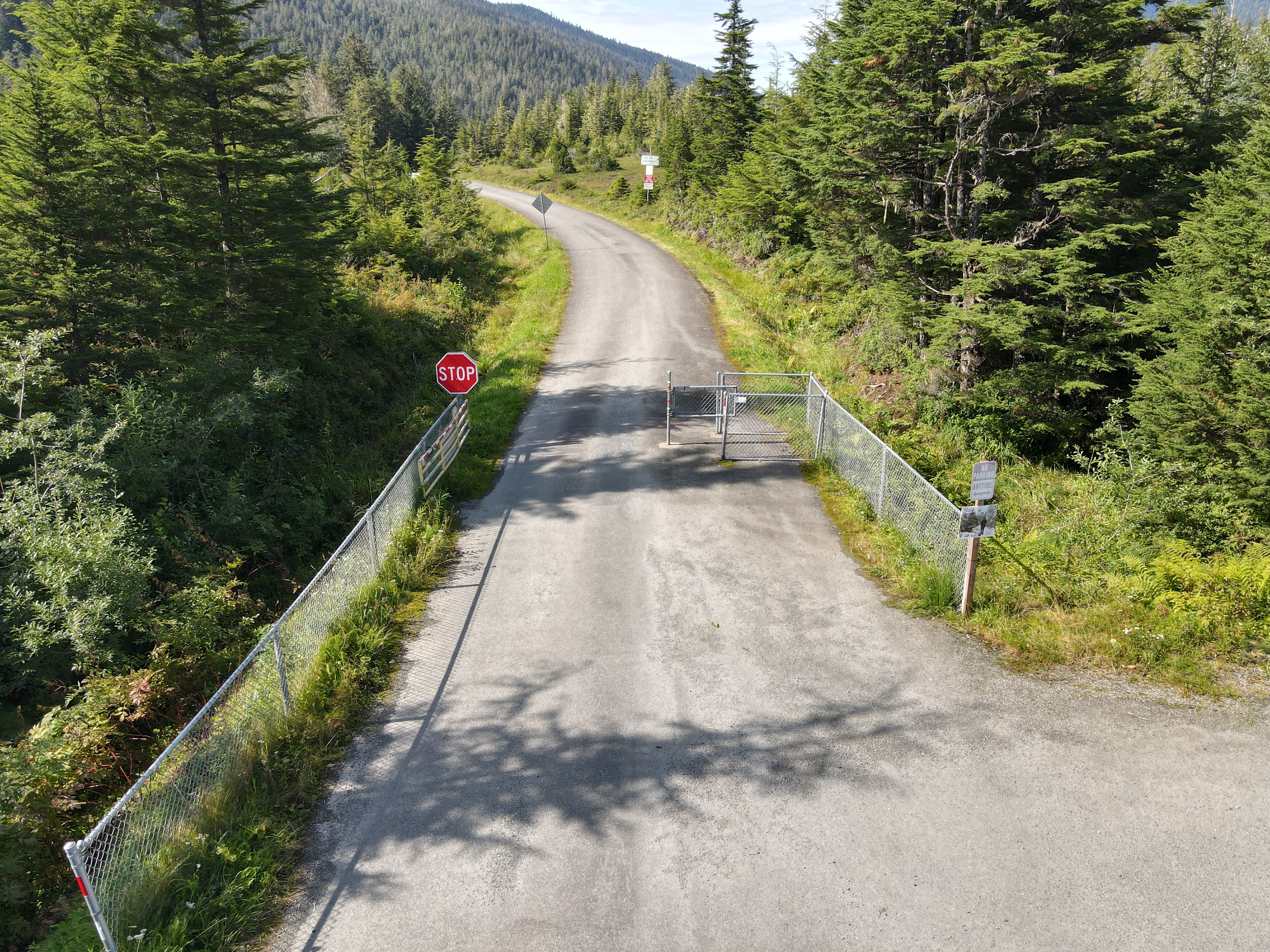 Image of the open gate at Montana Creek Road.