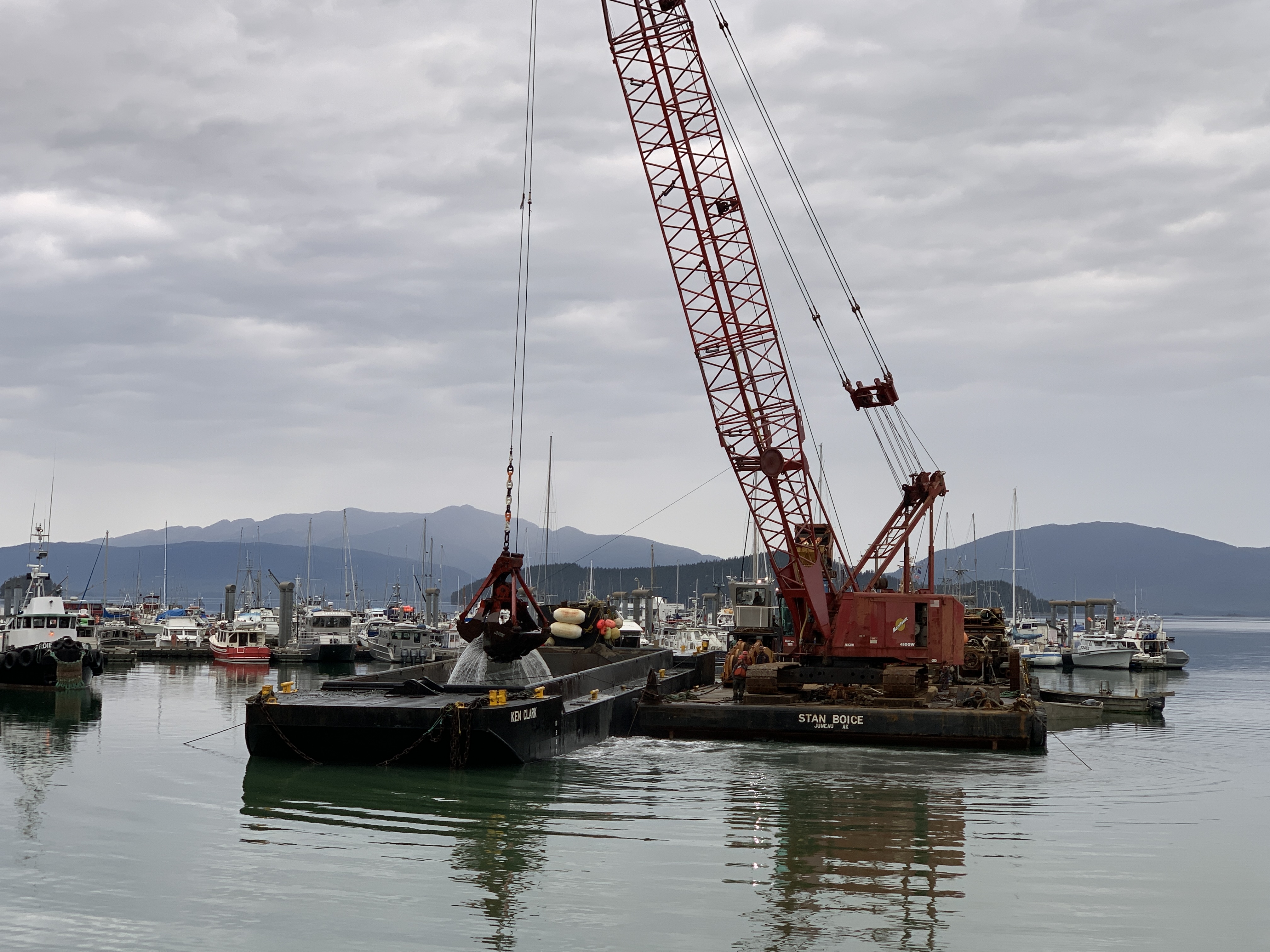 Crane and Barge Dredging within the Harbor