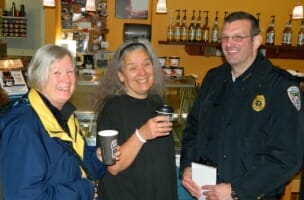 Photo of Chief with Citizens at coffee house