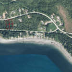 This is an aerial image of four lots in the South Lena Subdivision that are for sale.