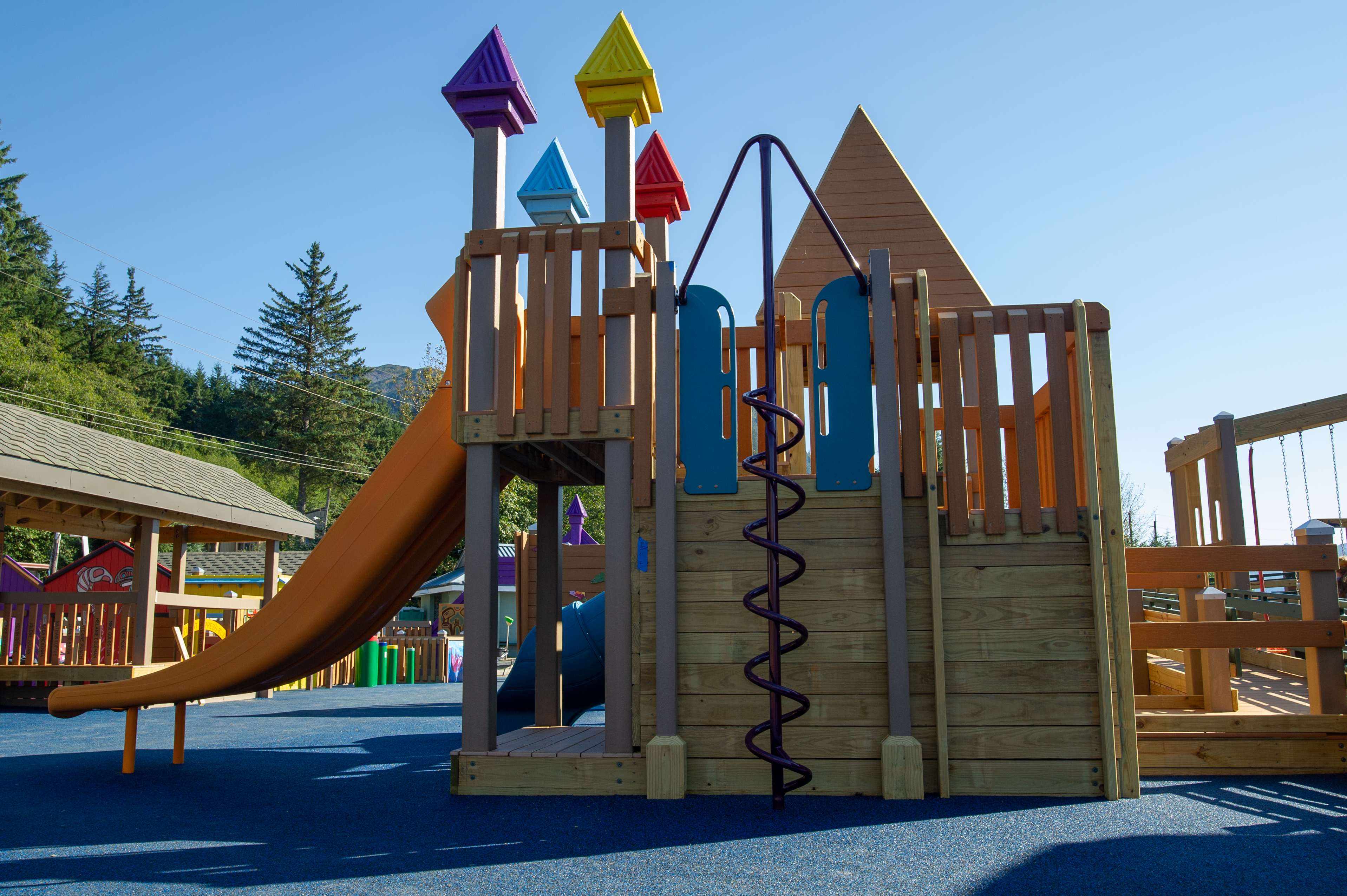 A slide and climbing area at Project Playground