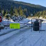 This is a picture of the gate to Montana Creek Road closed for the winter.