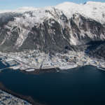 This is an aerial photo looking down on Mount Juneau, downtown, and part of Douglas.