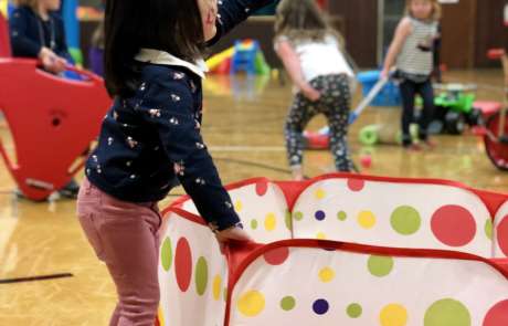 IMG_1929 A child plays with a ball during Preschool Open Gym at Mount Jumbo Gym.