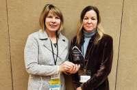 This is a picture of Beth McKibben & Laura Boyce accepting “Most Innovative Planning Project” from the Alaska Chapter of the American Planning Association for Blueprint Downtown Community Visioning.