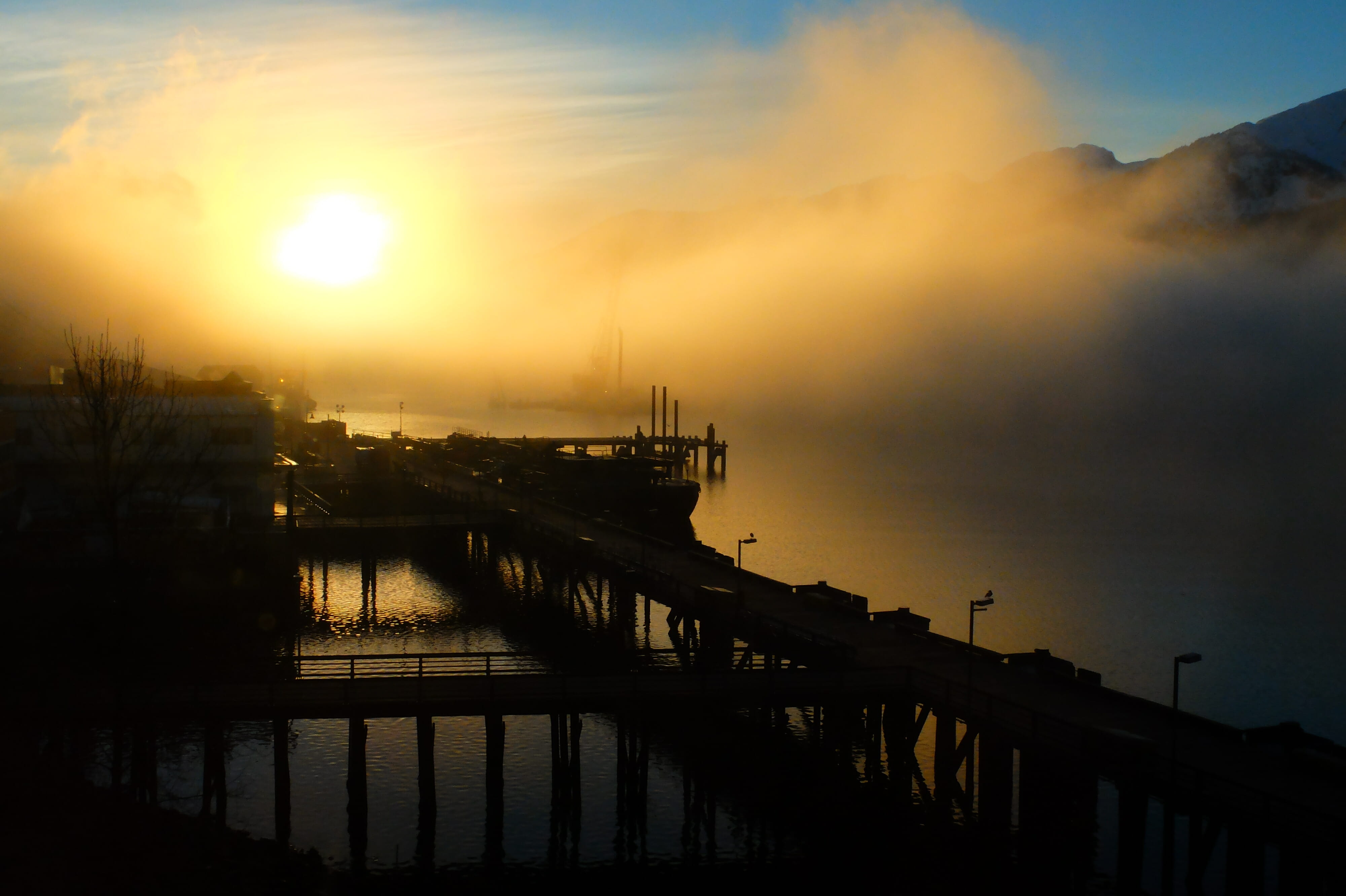 Foggy sunrise on the seawalk