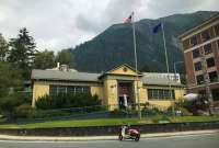 A view of the Juneau-Douglas City Museum from the front, with Mount Juneau in the background.