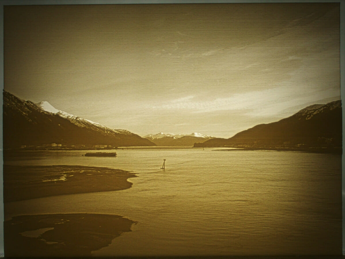 A flat lithophane made from a photo of Gastineau Channel, lit from the back.