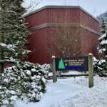 Photo of Centennial Hall exterior in snow