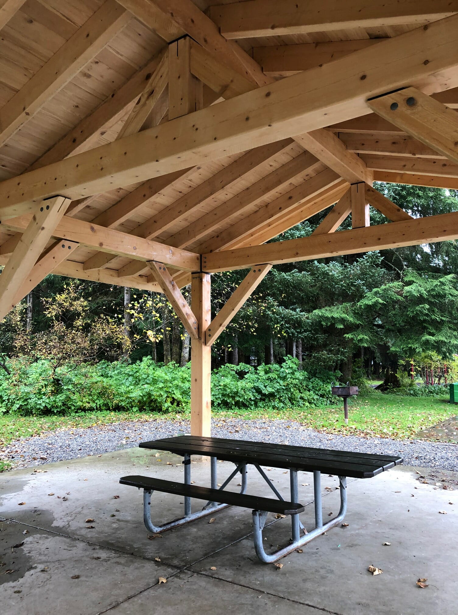 Accessible table sits under the Riverside Rotary Park shelter.