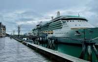 Photo of cruise ship docked along Seawalk