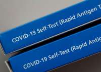 image of COVID at-home test boxs