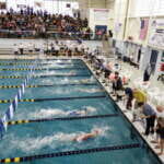 Photo of swimmers approaching the wall in DPAC pool lanes