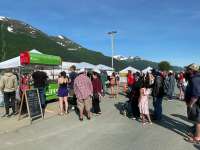 Photo of crowds at vendor booths in Savikko Park