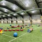 Photo of Field House interior with children's toys on the turf