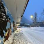 Photo of City Hall mural and snowy street