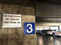 Photo of parking garage sign reading 