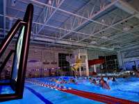 Photo of floating screen looming over DPAC pool