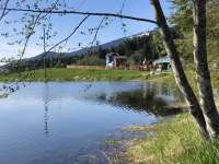 Photo from the shore of Twin Lakes of Project Playground in the distance