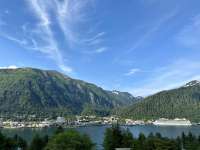 Photo of downtown Juneau on a sunny summer day from across the channel