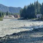 The Mendenhall River running high on a sunny day