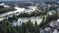 Aerial view of Mendenhall River with surrounding streets flooded