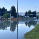 Intersection of Riverside Drive & Riverwood flooded with water