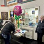 Participants sign in at Treadwell Arena for the 2023 Sk8 to Elimin8 Cancer Remembrance Walk.