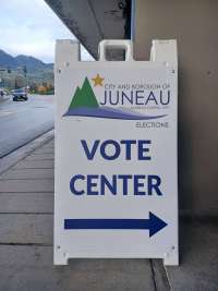 Large sandwich board reading VOTE CENTER