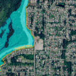 Map of projected inundation levels at 16 feet, showing HESCO barriers successfully limiting inundation