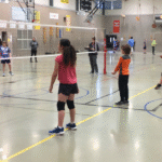 Kids practice playing volleyball during a CBJ Parks & Recreation program.