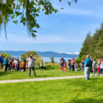 Juneau residents gather on a clear summer day at the Jensen-Olson Arboretum.