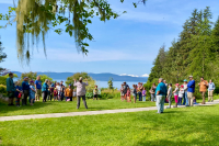 Juneau residents gather on a clear summer day at the Jensen-Olson Arboretum.