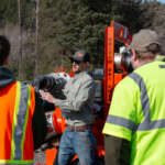 CBJ staff and partners learn about the industrial-grade pumps on loan from USACE.
